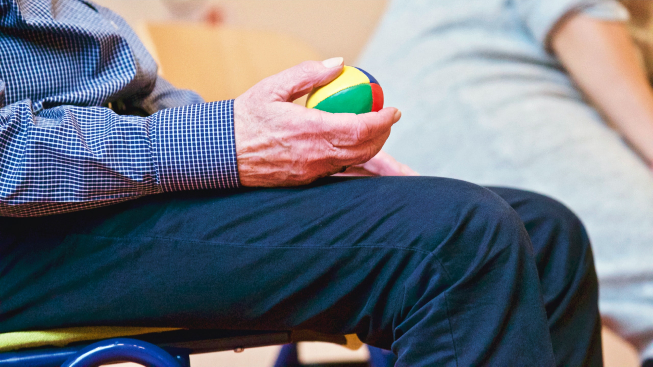 photo of man doing occupational therapy
